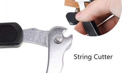 string winder with string clipper and bridge pin remover