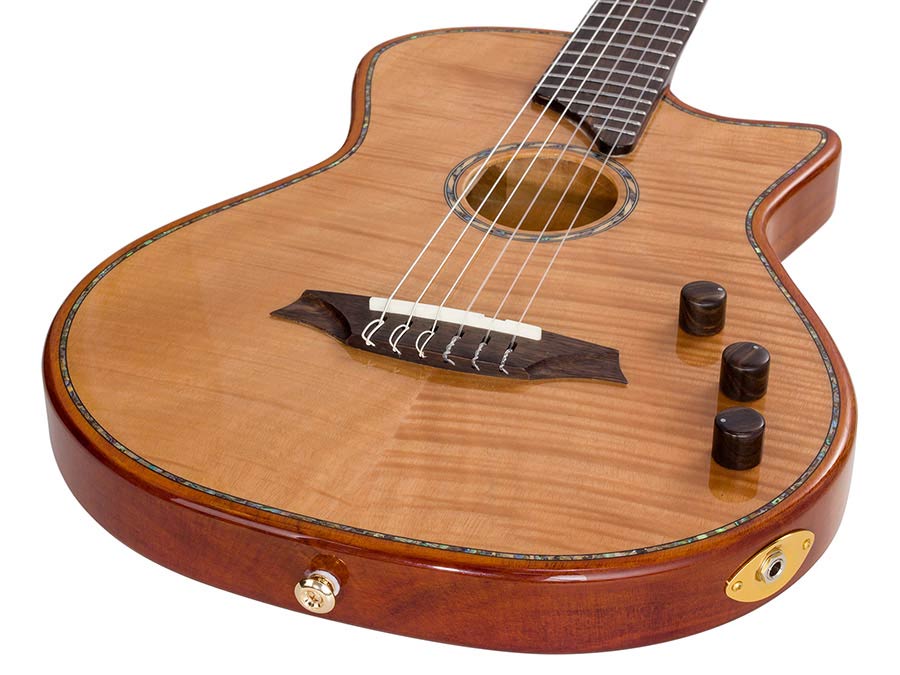hollow body electric nylon guitar, spruce top, mahogany body, amara ebony fb, nat + hard shell case
